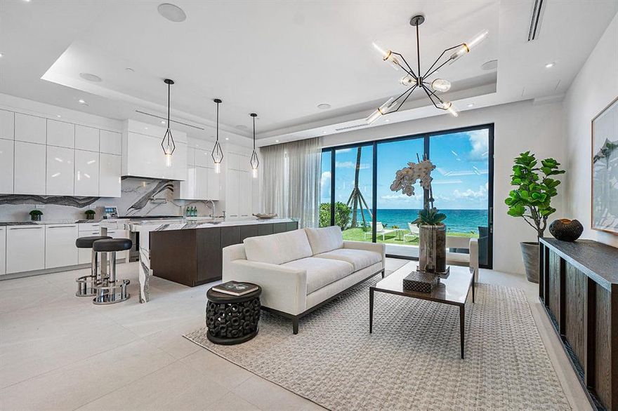 Experience the luxury of surf and sand at your doorstep and indulge in four stories of highly curated oceanfront living. This is 3621 S Ocean - Palm Beach County's most exclusive address on 200' of pristine beach frontage. Ideally located between Delray Beach & Boca Raton just 30-minutes from Palm Beach and FLL Airports! Richly-appointed interiors, lush yards, gated entry, security and cameras in every villa, private elevator, rooftop entertainment deck & in-ground plunge pool with every unit. From the jaw-dropping Miele kitchen to the jewel box living spaces framing incredible ocean views, every detail is wrapped in luxury. Smart home automation, 2-car garage and a private gated boutique presence elevate...the pinnacle of oceanfront living. Buyer to pay doc stamps and title insurance.