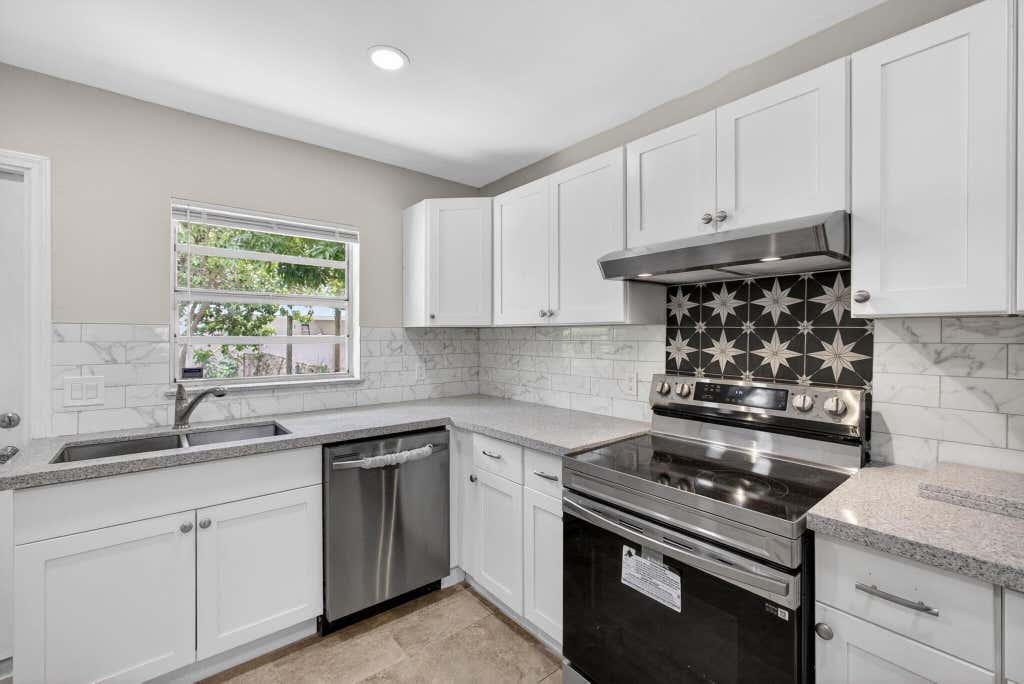 Photo of 9484 Sun Court, Palm Beach Gardens, FL 33403 (MLS # B26064312)