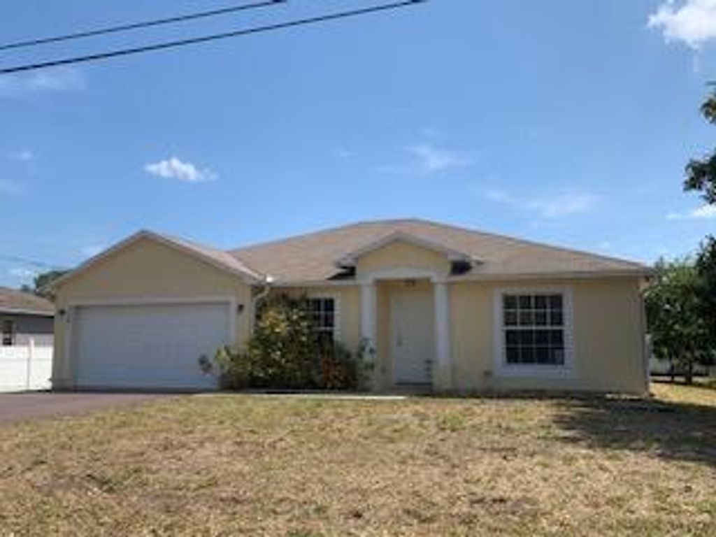 Photo of 2461 SW Waikiki Street, Port St Lucie, FL 34953 (MLS # R10877000)