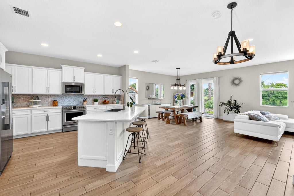 Photo of 11971 Cypress Key Way, Royal Palm Beach, FL 33411 (MLS # B26020800)