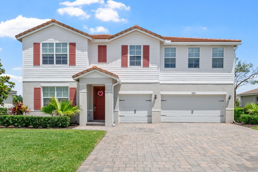PRICED TO SELL!! Stunning waterfront home built in 2018, featuring 5 bedrooms, 3.5 baths, and a versatile layout designed for modern living. The primary suite is on the first floor, offering privacy and beautiful water views. The open concept living areas flow seamlessly into a well- appointed kitchen, perfect for entertaining. A dedicated office provides an ideal work from home space. Upstairs, a spacious loft offers endless possibilities for a media room, play area, or second living space. Offered fully furnished, this move in ready home combines comfort, style, and the best of waterfront living. Conveniently located near PBI, Wellington Equestrian and Polo activities, restaurants & shopping.