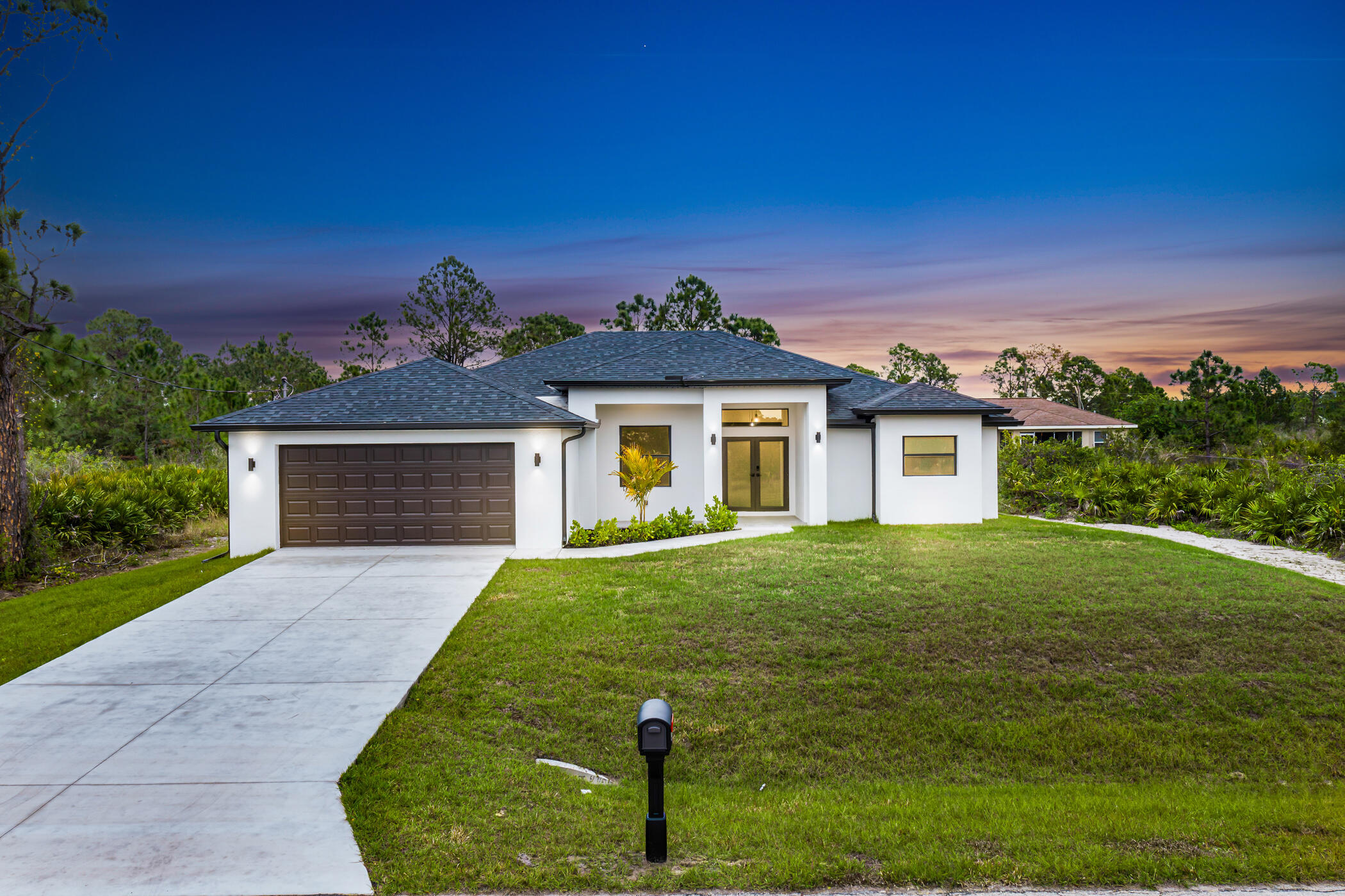 New Construction Home! Large 4 bedroom 2.5 baths. large 2 car garage with 1919 sqft under air. Impact window and doors. This house features high coffer ceilings, large master bedroom, his and her walk in closets, master bath feels like a spa with a large shower and free standing soaking tub. Utility room inside with utility sink. Enjoy the outdoors in the huge, covered terrace. Covered terrace piped for outdoor kitchen.