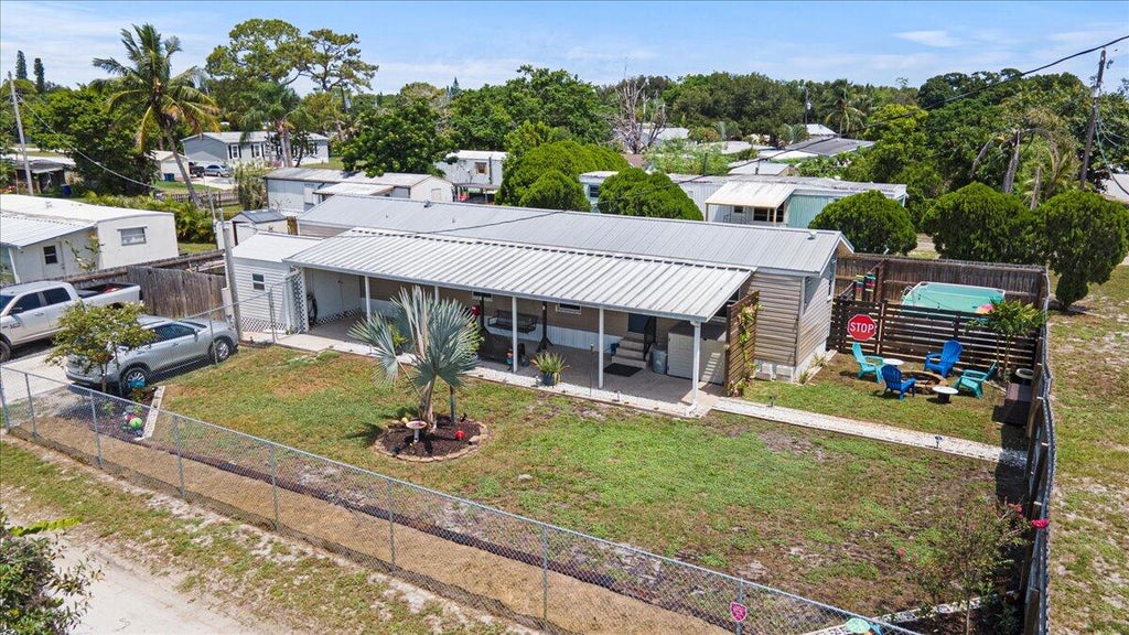 Photo of 1518 NE Cardinal Avenue, Stuart, FL 34994 (MLS # R11009391)