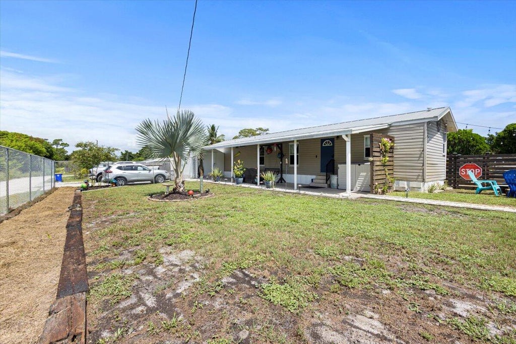 Photo of 1518 NE Cardinal Avenue, Stuart, FL 34994 (MLS # R11009391)