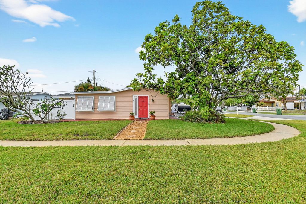 Photo of 83 Andros Road, Palm Springs, FL 33461 (MLS # B26005932)