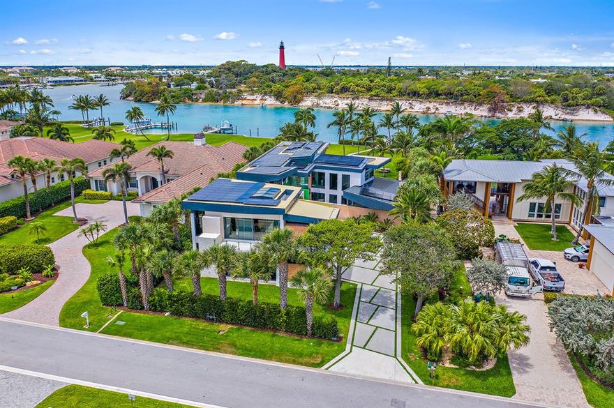 A rare contemporary masterpiece overlooking the clear blue Intracoastal Waterway and the iconic Jupiter Lighthouse. Jupiter Blue water at its finest – located within minutes of waterfront dining, the inlet and all water activities. No expense spared in this 6 bedroom 8 ½ bath dream home in the prestigious Jupiter Inlet Colony. The home exemplifies quality, craftsmanship technology and design at it's best with hand selected modern features, sleek lines, highest quality finishes and top of the line everything, including a Boffi Kitchen with Gaggenau, Sub-Zero, Meile and Nanna appliances, a 600 bottle wine cellar, state of the art gym with steam room/ shower and total immersion soaking tub and a private roof-top sun deck.  This architectural masterpiece was built to enjoy all that outdoor lifestyle has to offer- featuring an outdoor covered loggia with summer kitchen, resort style pool with massive water wall and a dock with lift; all overlooking the crystal-clear waterway and lighthouse.

If you are looking to live in a home that, has it all, then your search is over!
