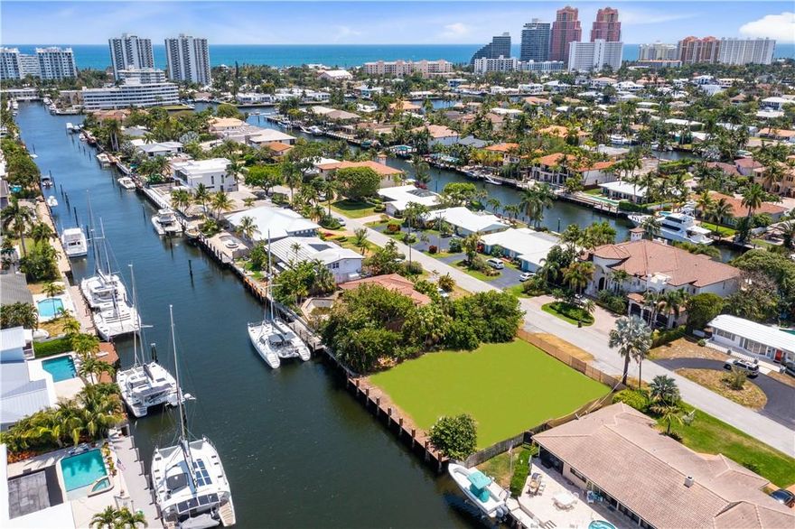 Coral Ridge Vacant Site Measures 100x100±. 
100 Ft Deep Water Accommodates 80 Foot Yacht.
Bayview School District. 
Lot Size: 10,000± Sq Ft.
The site is Cleared and Ready to Build. 
5800± Sq Ft Under AC Floor Plans are Available.