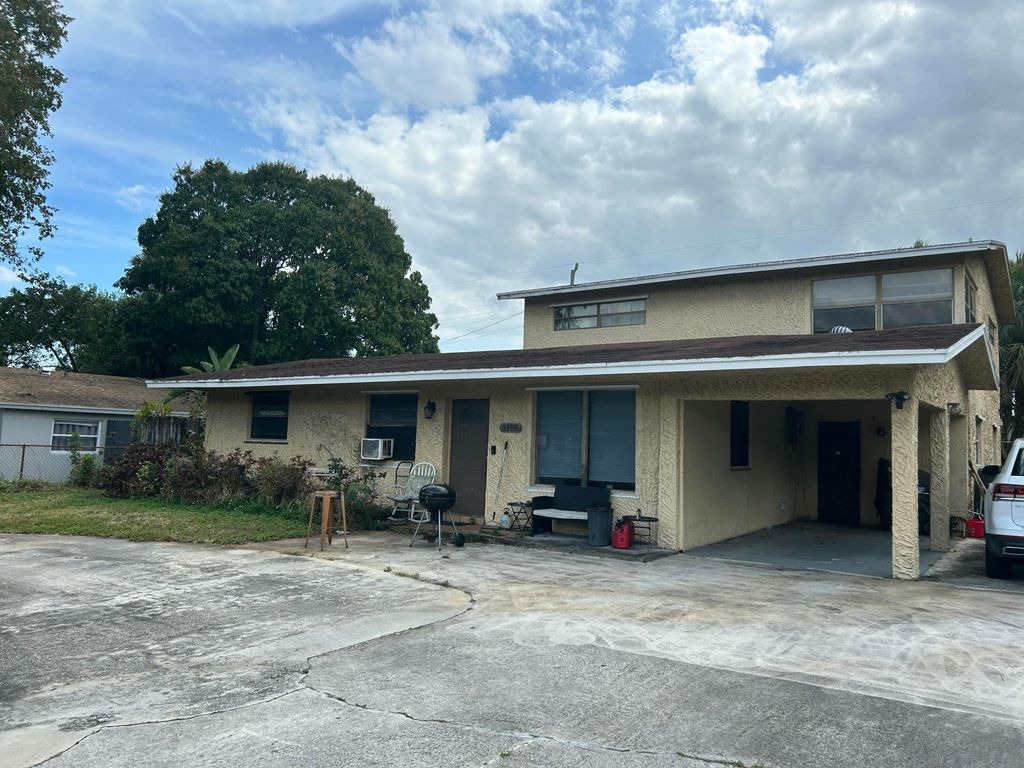 Photo of 3390 NW 8th Place, Lauderhill, FL 33311 (MLS # R11165143)