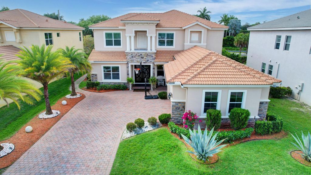 Photo of 8952 Cypress Grove Lane, Royal Palm Beach, FL 33436 (MLS # B26018632)