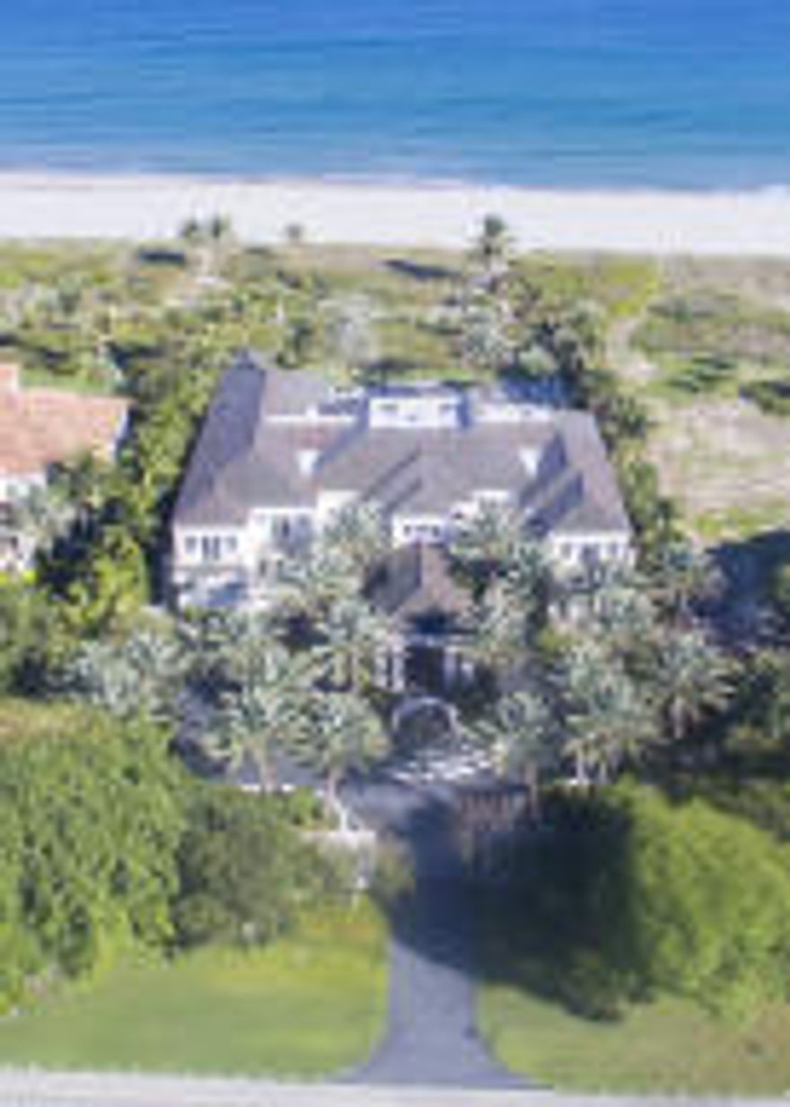 Inspired by the ocean's splendor, the luxuries of a five-star resort, and the sensibilities of international modern design, this sublime masterwork harmonizes with the environment on 155+/- feet of oceanfront in the prestigious estate section of Delray Beach.  Orchestrated to engage the senses and indulge every desire, this sleekly elegant seven-bedroom showplace sprawls over a total of 31,786+/- square feet with an interplay of bold sculptural forms and serene water features both inside and outdoors, where glowing fire bowls add another elemental effect.***SEE SUPPLEMENT FOR ADDITIONAL INFORMATION AND DISCLAIMERS.***