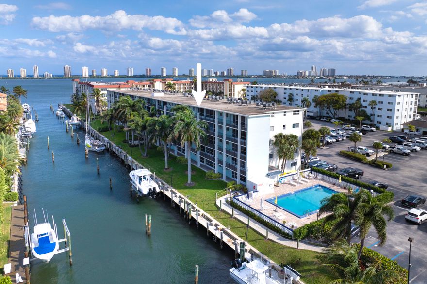 Put your own personal touches in spacious North Palm Beach waterfront condo. Large living dining room combo, kitchen with stainless steel appliances, bedroom has two closets one is a walkin, bath was updated a few years back. Screened patio, storage unit, assigned parking, community pool. Convenient to golf, shopping, great restaurants, parks and beaches.