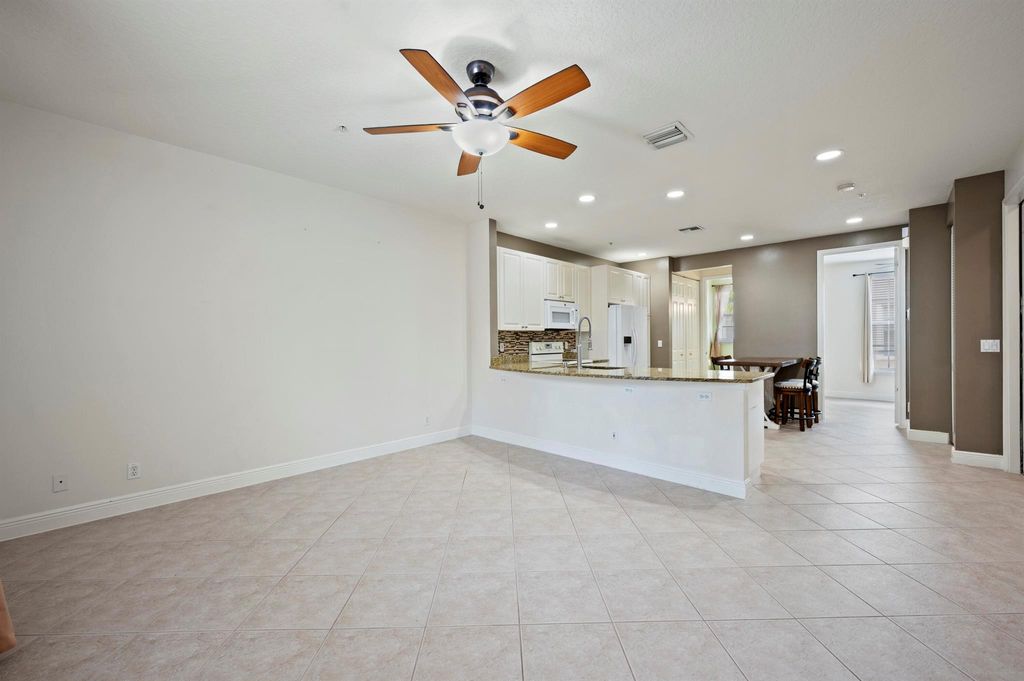 Photo of 115 Apalachee Lane, Jupiter, FL 33458 (MLS # R10962558)