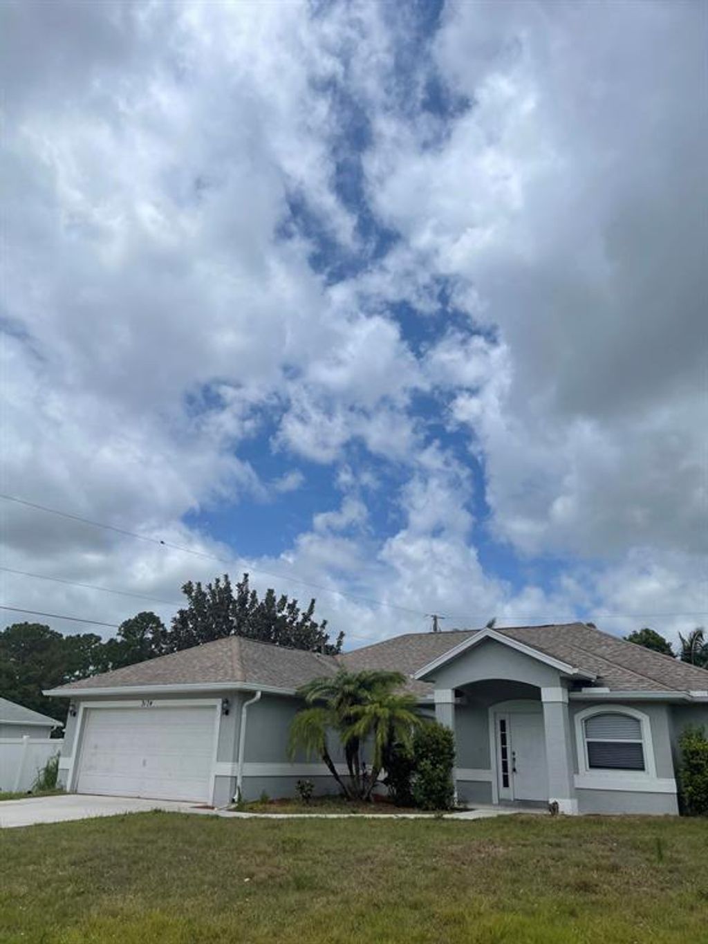 Photo of 3174 SW Nutley Street St, Saint Lucie West, FL 34953 (MLS # R10723276)