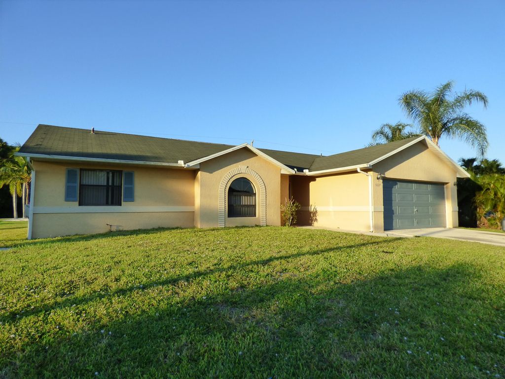 Photo of 5629 NW Commodore Terrace, Port Saint Lucie, FL 34983 (MLS # R10962532)