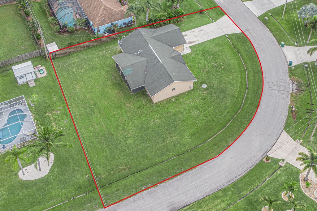 Photo of 5629 NW Commodore Terrace, Port Saint Lucie, FL 34983 (MLS # R10962532)