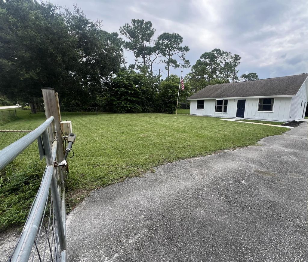 Photo of 12203 59th Street N, The Acreage, FL 33411 (MLS # R11011327)