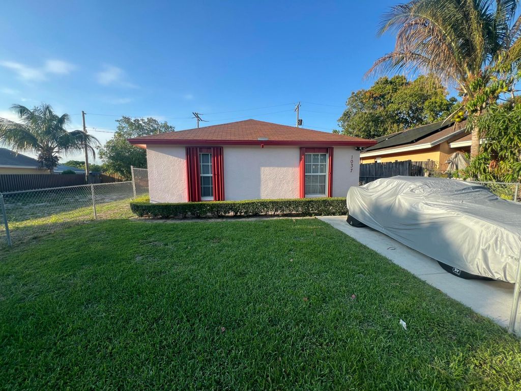 Photo of 1037 17th Street, West Palm Beach, FL 33407 (MLS # B26007629)