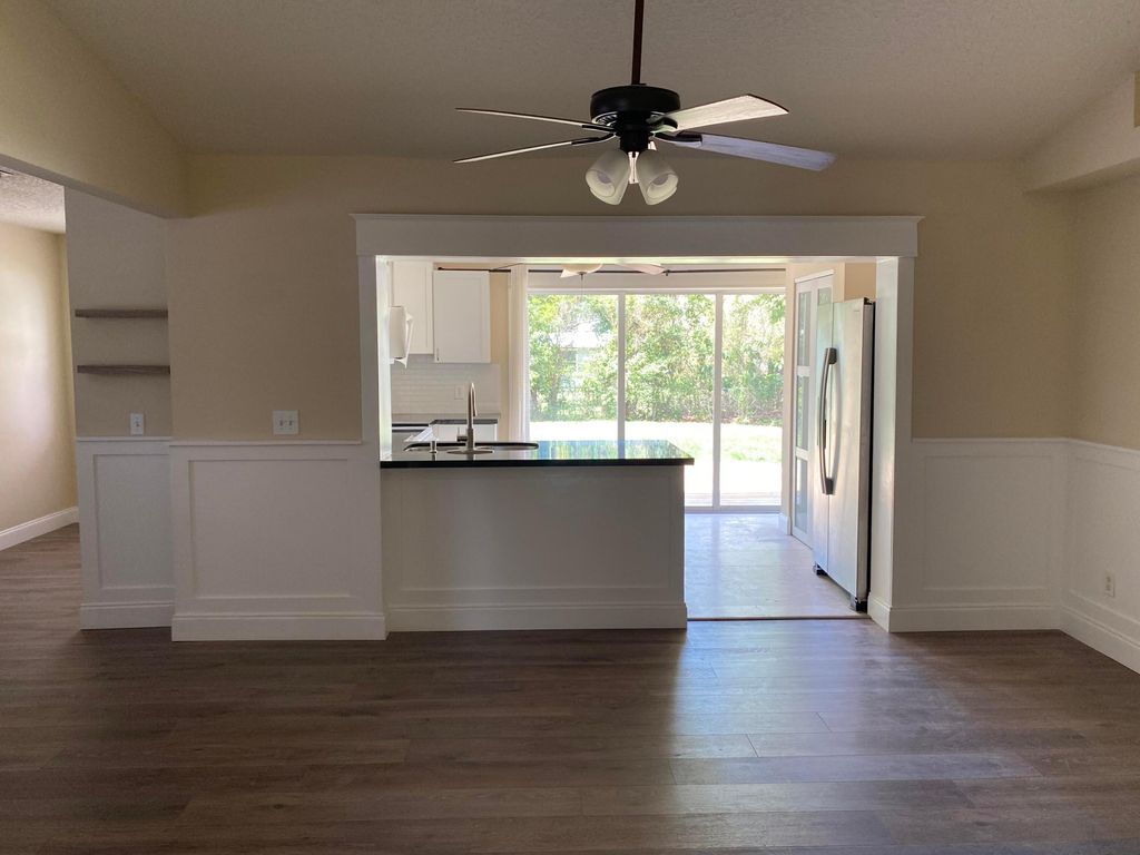 Photo of 1057 SW Spruce Street, Palm City, FL 34990 (MLS # B26030752)