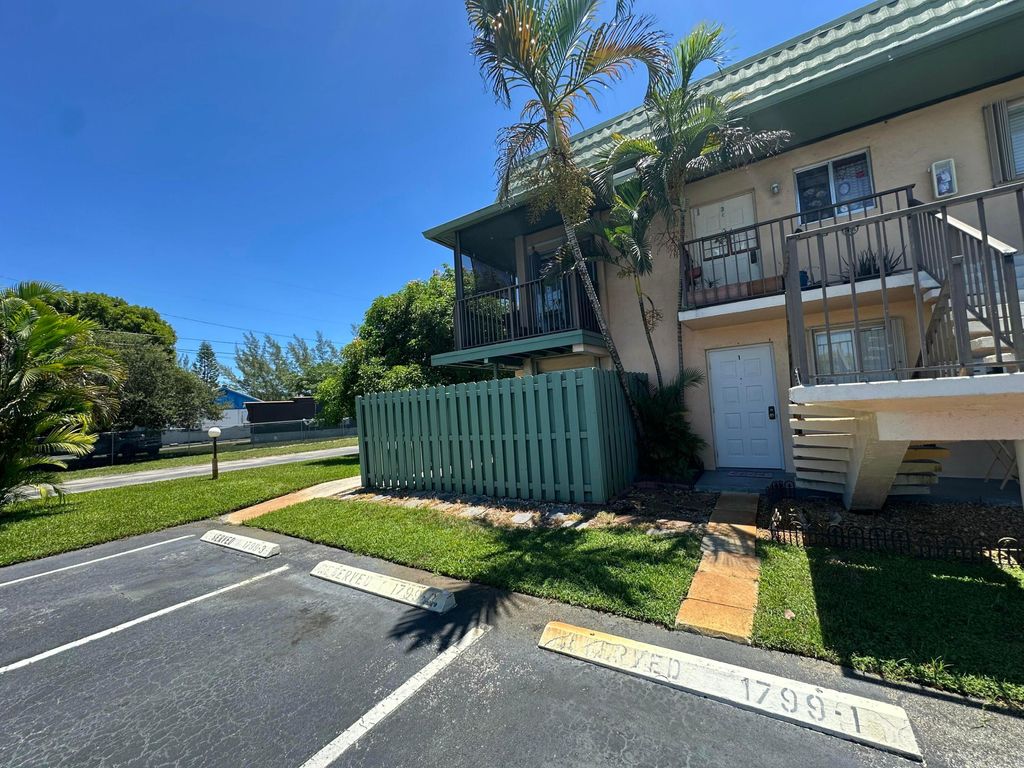 Photo of 1799 Fairview Villas Drive #1, Palm Springs, FL 33406 (MLS # R11163745)