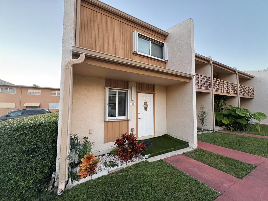Discover one of the most meticulously maintained townhomes in Hollywood at 2831 Pierce St #100, a beautifully updated corner unit offering exceptional value in one of South Florida’s best-priced areas. This home features tiled flooring downstairs, wood floors upstairs, fresh paint, updated lighting, an upgraded kitchen and baths, plus a newer A/C, tankless water heater, and full-size washer and dryer. Abundant natural light flows through the extra corner-unit window, while private rear-facing balconies and two reserved parking spaces add extra comfort and convenience. Ideally located near everything with easy access to I-95, the community also offers a refreshing pool, enhancing the South Florida lifestyle. HOA requires a 680 credit score.