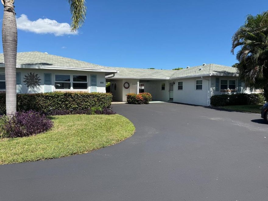 Cozy 2 BR/2BA villa with attached carport in Country Manors. Roof installed 2018, Impact windows. This sought after 55+ community offers 9 swimming pools, a clubhouse with social events, fitness classes, bingo, dances, and neighborhood dinners, along with card rooms, pool tables, and shows on the community stage. Residents also enjoy shuffleboard, walking trails, and easy access to nearby shops, restaurants, banks, movies, and parks.