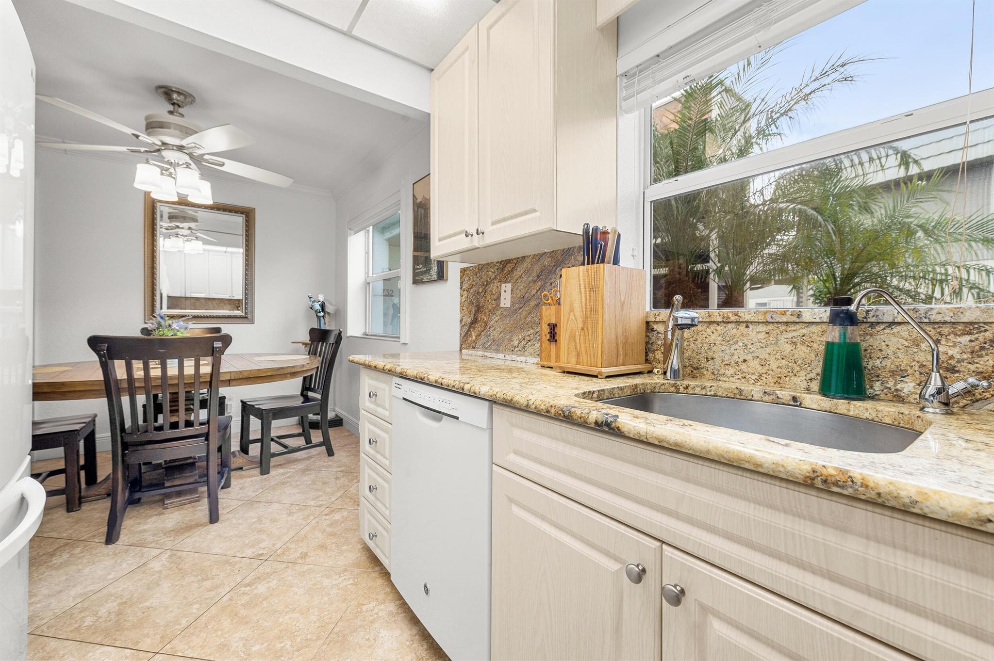 Welcome to this well-maintained 55+ unit In Kings Point Gated Commnuity offering comfort and convenience. The building is fully funded, providing peace of mind for future ownership. Inside, you'll find tile flooring throughout, granite countertops, and a 2025 A/C system with an additional A/C unit in the patio. Appliances were updated in 2018, with a water tank replaced in 2021 . A new front door adds curb appeal, This home can be sold fully furnished, with furniture negotiable to fit your needs. Kings Point offers great amenities like golf, pools, cafe, clubhouse, nearby shopping with courtesy bus and so much more!