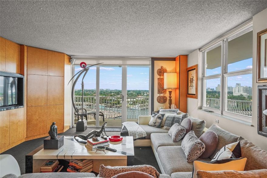 Stunning views of the Intracoastal Waterways North and South, the spectacular Venetian pool, Atlantic Ocean and City Skyline from this very desirable wrap around corner balcony. See a parade of yachts, the sunset, the annual  Air Show, Boat Show and Boat Parade. Unit has hurricane impact doors/windows and extra storage area. The Venetian is a "Resort style" condominium with heated large pool, spa/hot tub, tiki bar, library and lobby with free wifi, 24hr security, ping-pong, billiard, a large fully equipped 24 hrs fitness center, 6 large bbq's grills and outdoor dining areas. One of the few boat docking facilities situated on Las Olas, beach and Intracoastal areas with no fixed bridges. Dockage as available! Internet and basic cable are included in the monthly maintenance fee. A must see!