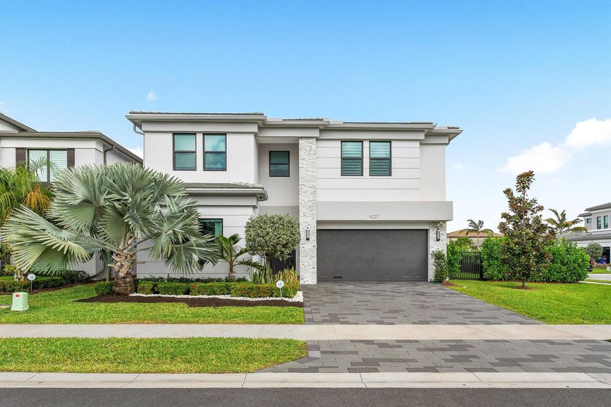 Boca Raton Luxury Home - Lake & Pool Views in Gated CommunityExperience luxury living in this 5-bedroom, 4-bath estate in one of Boca Raton's most exclusive gated communities. Features include:Main-level master suite for comfort & privacyChef's kitchen with stainless steel appliancesBright living room with pool & lake viewsHome gym + large private officeThree-car garage with EV charging stationEnjoy five-star amenities: heated resort-style pool, full fitness center with classes, award-winning tennis courts, playgrounds, clubhouse, and on-site restaurant.📍 Prime location near top-rated schools, upscale shopping, and pristine beaches.This lakefront Boca Raton dream home offers elegance, comfort, and a resort lifestyle all in one.