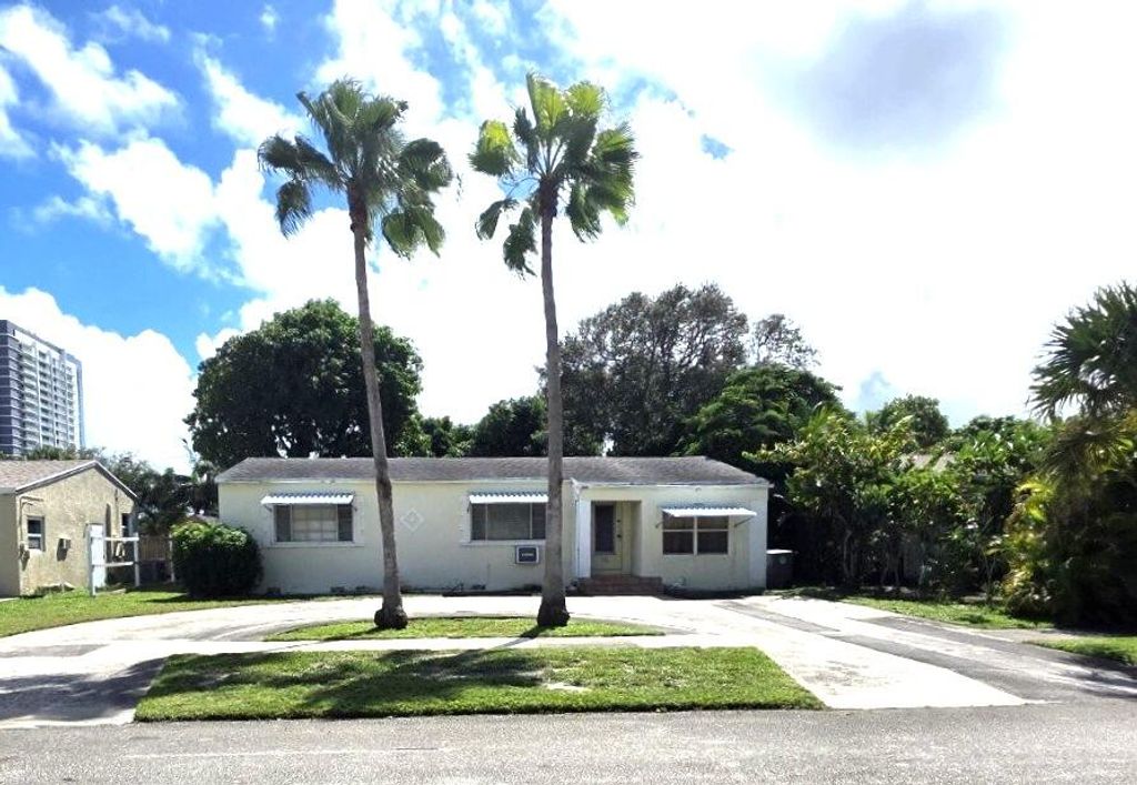 Photo of 136 Evergreen Drive, Lake Park, FL 33403 (MLS # R11131107)