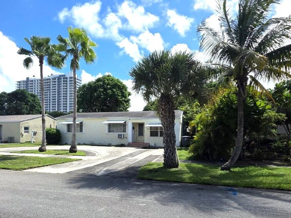 Photo of 136 Evergreen Drive, Lake Park, FL 33403 (MLS # R11131107)