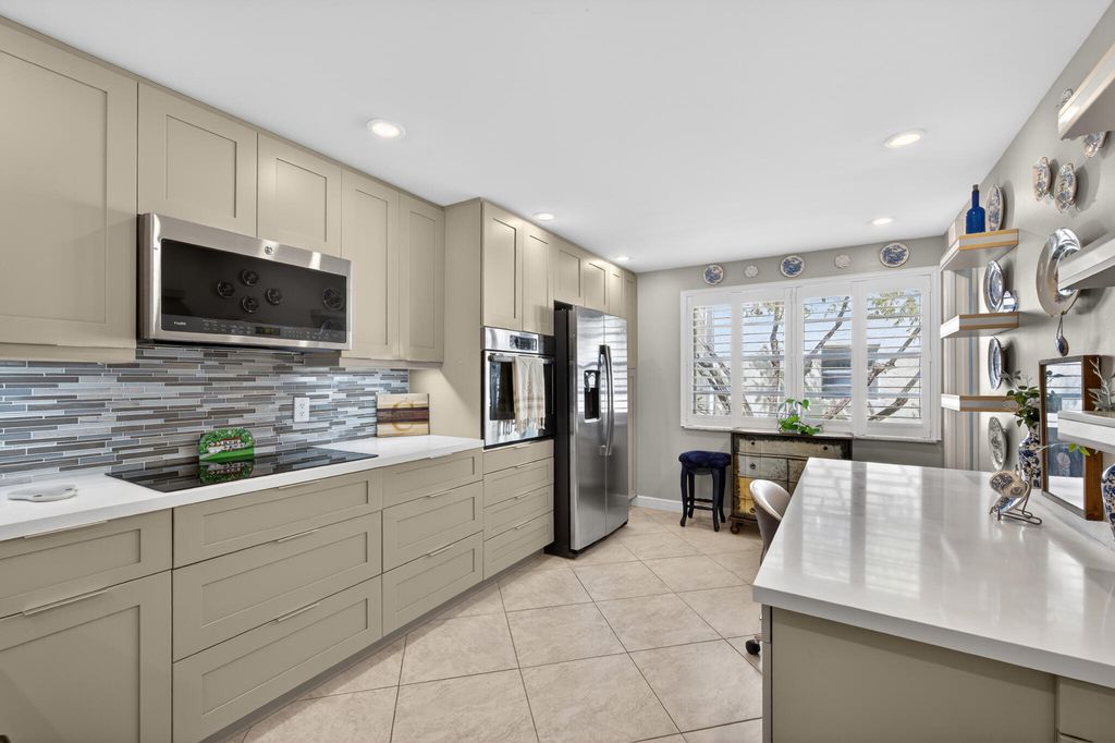 Photo of 8770 Holly Court #101, Tamarac, FL 33321 (MLS # B26016498)