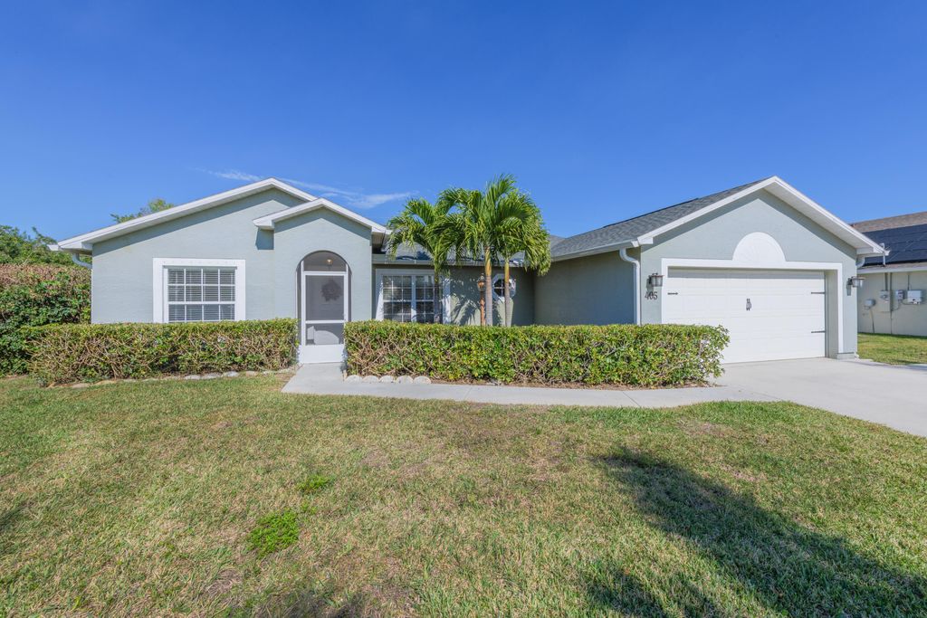 Photo of 405 SW Alcan Drive, Port Saint Lucie, FL 34953 (MLS # R10956744)