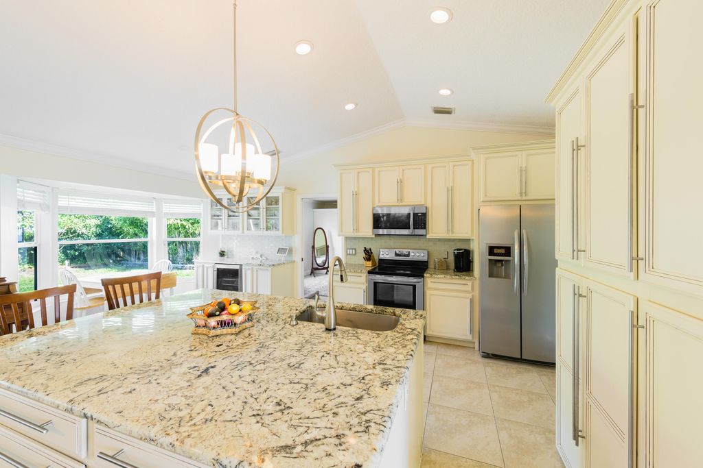 Photo of 405 SW Alcan Drive, Port Saint Lucie, FL 34953 (MLS # R10956744)