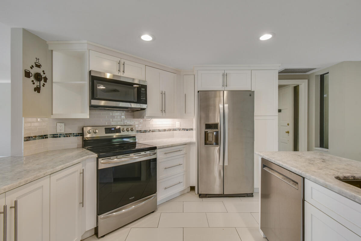 OLD PORT COVE HARBOR VILLAGE CONDO - Residential