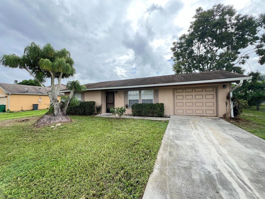 Photo of 562 SW Butler Avenue, Port Saint Lucie, FL 34953 (MLS # R11030095)