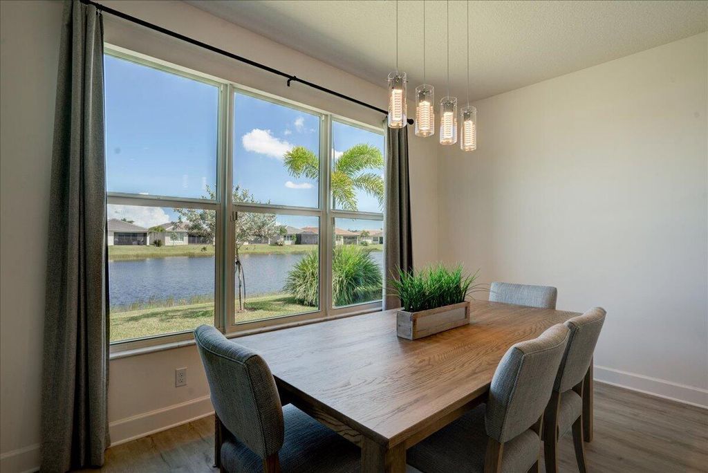 Photo of 13522 SW River Rock Road, Port Saint Lucie, FL 34987 (MLS # R10921932)