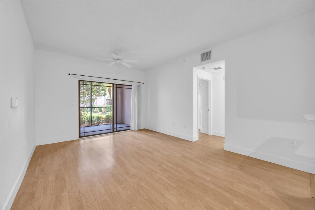 Photo of 3022 Alcazar Place #104, Palm Beach Gardens, FL 33410 (MLS # R11122013)