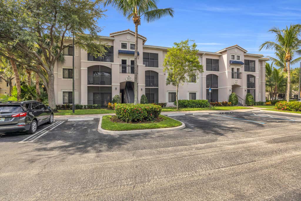 Photo of 3022 Alcazar Place #104, Palm Beach Gardens, FL 33410 (MLS # R11122013)