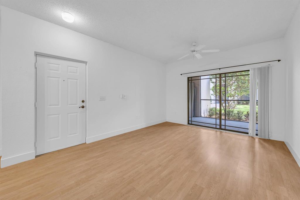 Photo of 3022 Alcazar Place #104, Palm Beach Gardens, FL 33410 (MLS # R11122013)