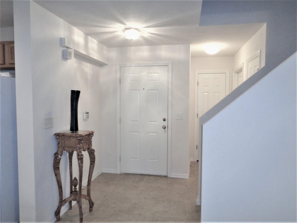 Photo of 1636 POINTE WEST Way, Vero Beach, FL 32966 (MLS # B26058028)