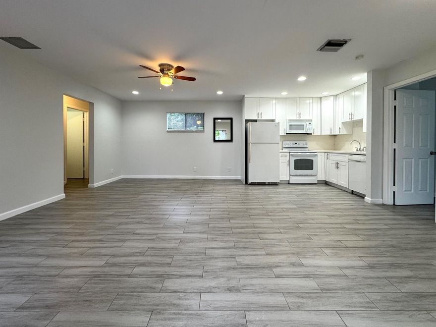 Stunning 2BR/2BA condo in The Crossings, fully renovated with modern finishes and flooded with natural light. Enter through your private fenced patio to a cozy porch, then up the stairs to a newly updated deck leading to the home. Bright, airy, and move-in ready, with a large grassy area for relaxing outdoors. Enjoy community tennis courts and a beautiful oversized pool. Perfectly located just minutes from Downtown and the beach -- a rare gem you don't want to miss!