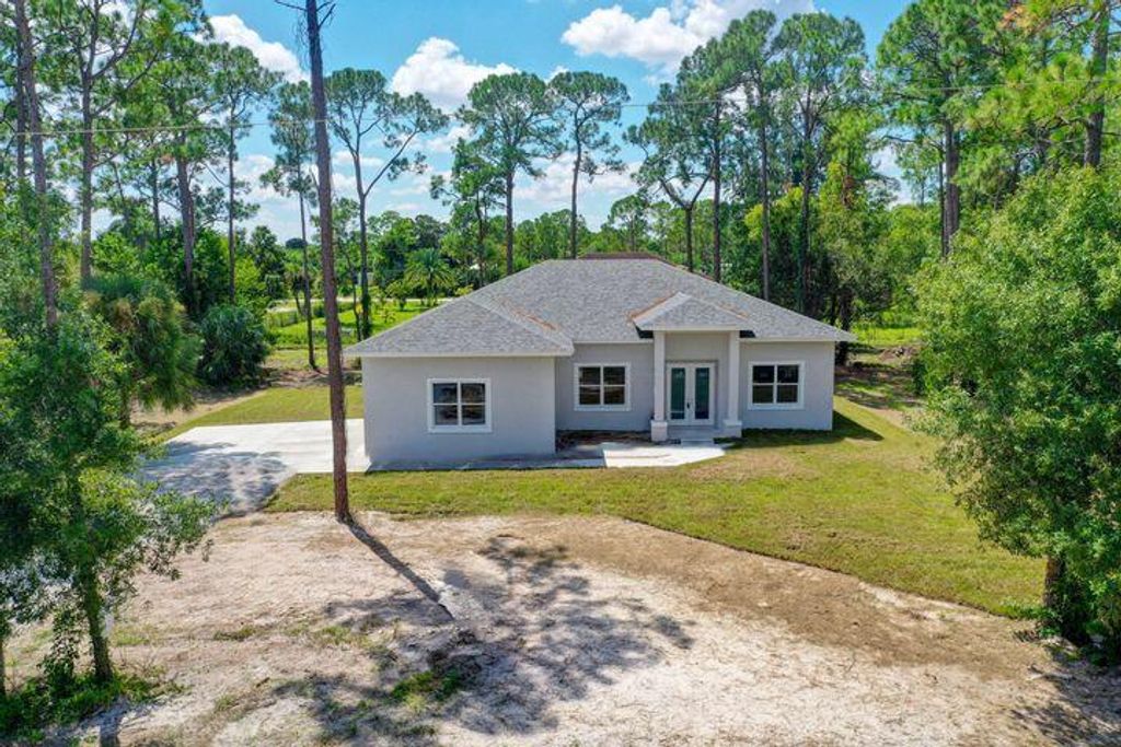 Photo of 17944 38th Lane N, Loxahatchee, FL 33470 (MLS # R10944234)