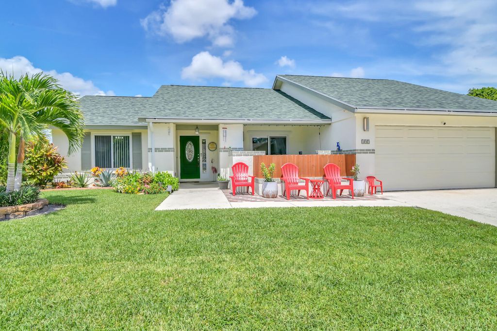 Photo of 197 Parkwood Drive, Royal Palm Beach, FL 33411 (MLS # R10814789)