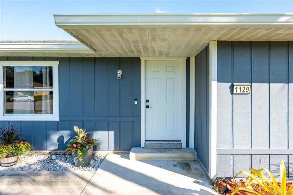 Photo of 1129 SW Jacqueline Avenue, Port Saint Lucie, FL 34953 (MLS # R11136627)