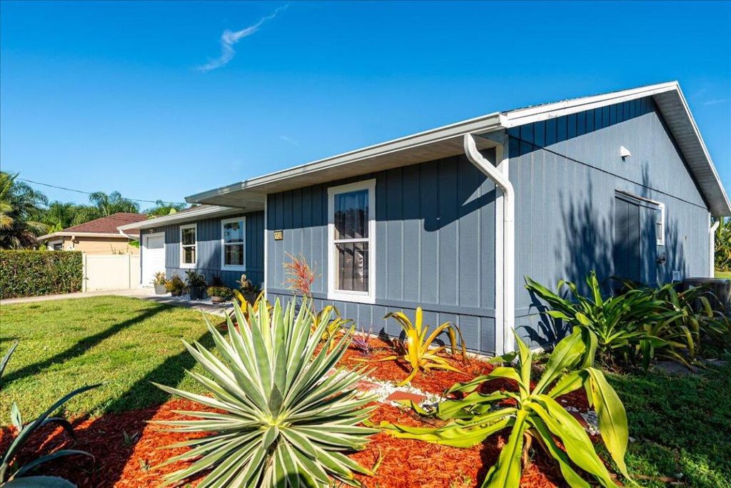 Photo of 1129 SW Jacqueline Avenue, Port Saint Lucie, FL 34953 (MLS # R11136627)