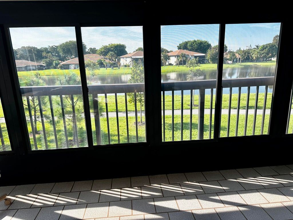 Photo of 5826 Areca Palm Ct #Unit B, Delray Beach, FL 33484 (MLS # R11022400)