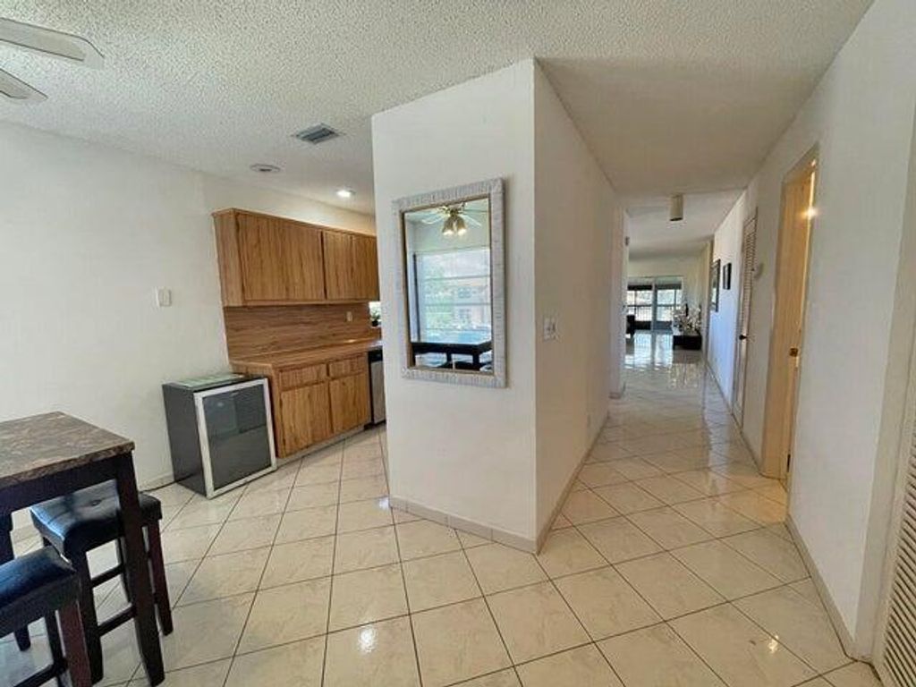 Photo of 5826 Areca Palm Ct #Unit B, Delray Beach, FL 33484 (MLS # R11022400)