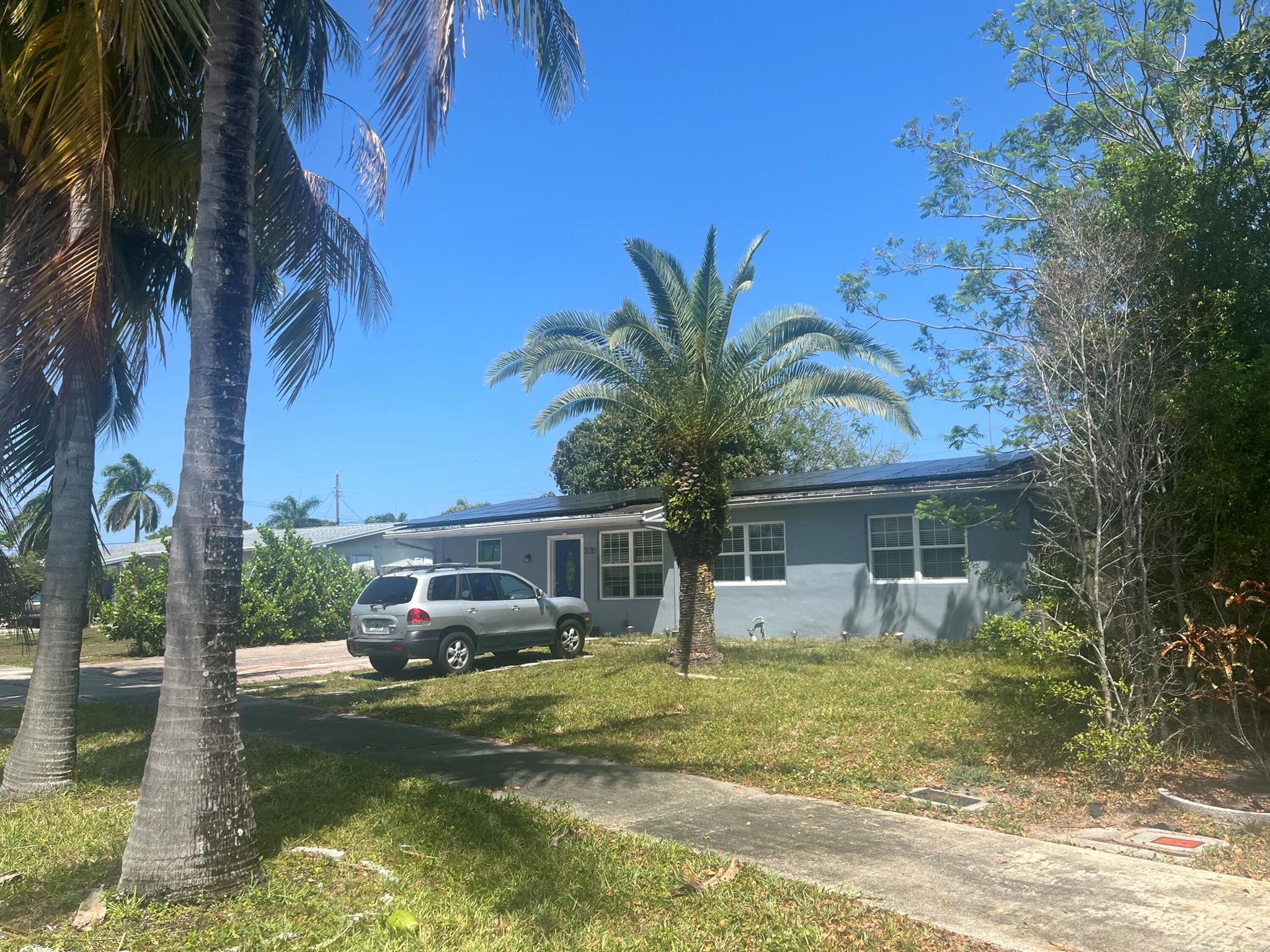 THE HOUSE HAS SOLAR PANELS AND WATER PURIFIER.