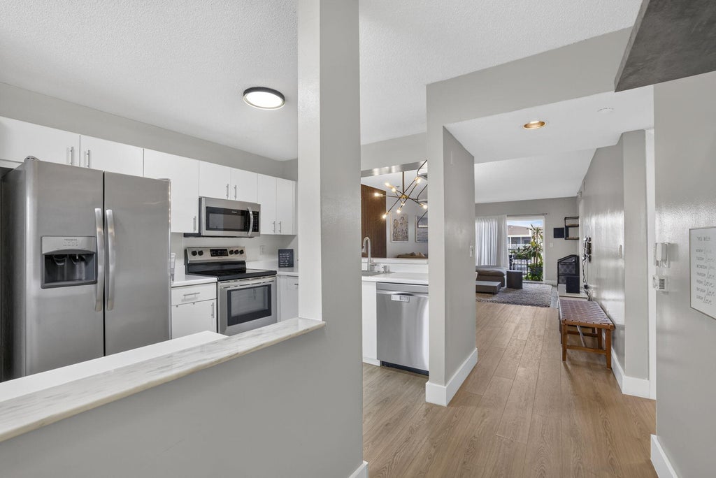 Photo of 9537 Weldon Circle #405, Tamarac, FL 33321 (MLS # B26074682)