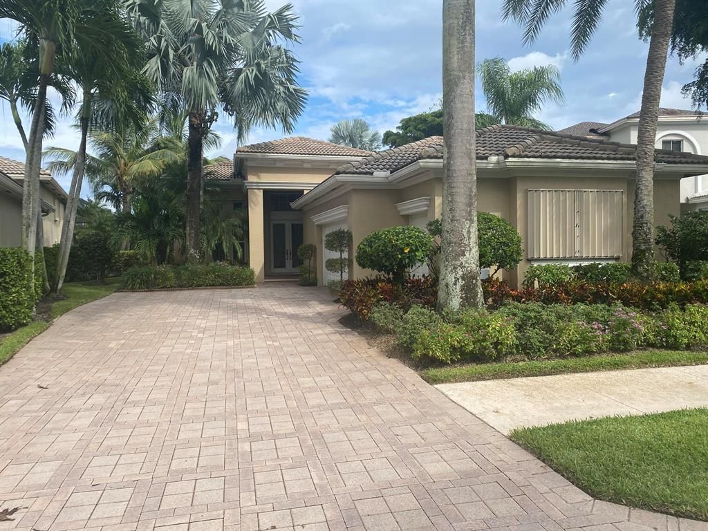Photo of 163 Orchid Cay Drive, Palm Beach Gardens, FL 33418 (MLS # R10747939)